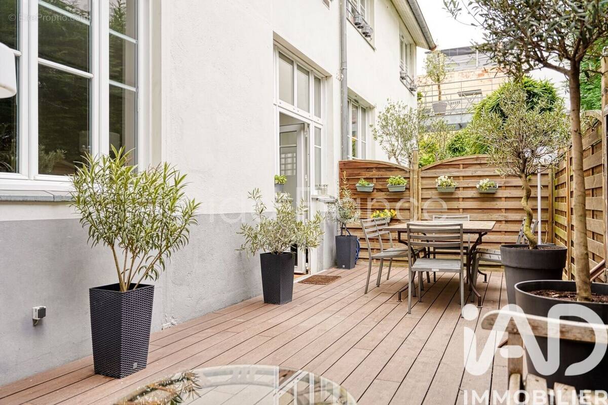 Photo 1 - Appartement à COURBEVOIE