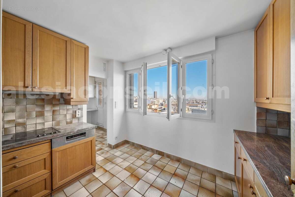 Photo n°5 - Appartement à PARIS-14E