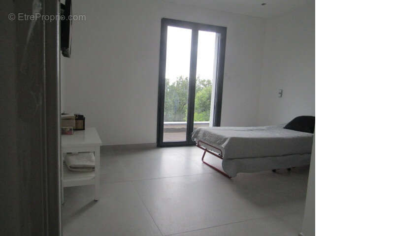 Villa neuve contemporaine 220m²  4 chambres sur terrain de 1200m² Donzère 465 000HAI - photo 11