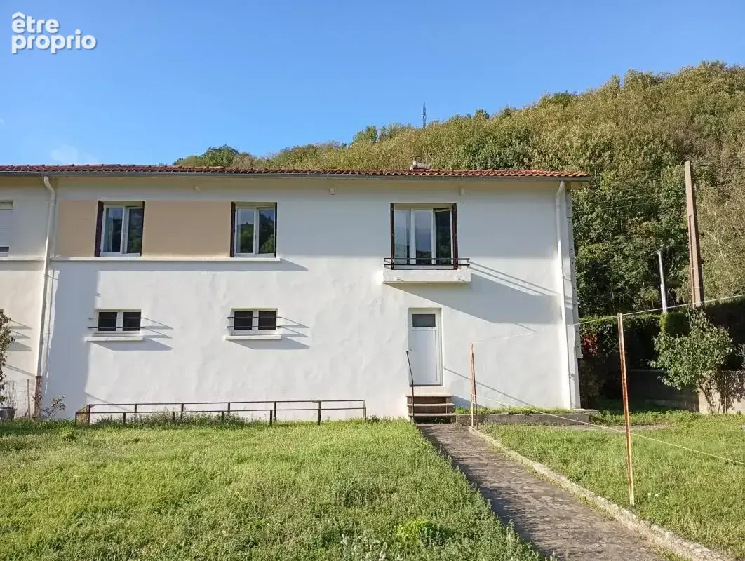 Maison mitoyenne de 85m² avec jardin et sous-sol - photo 4