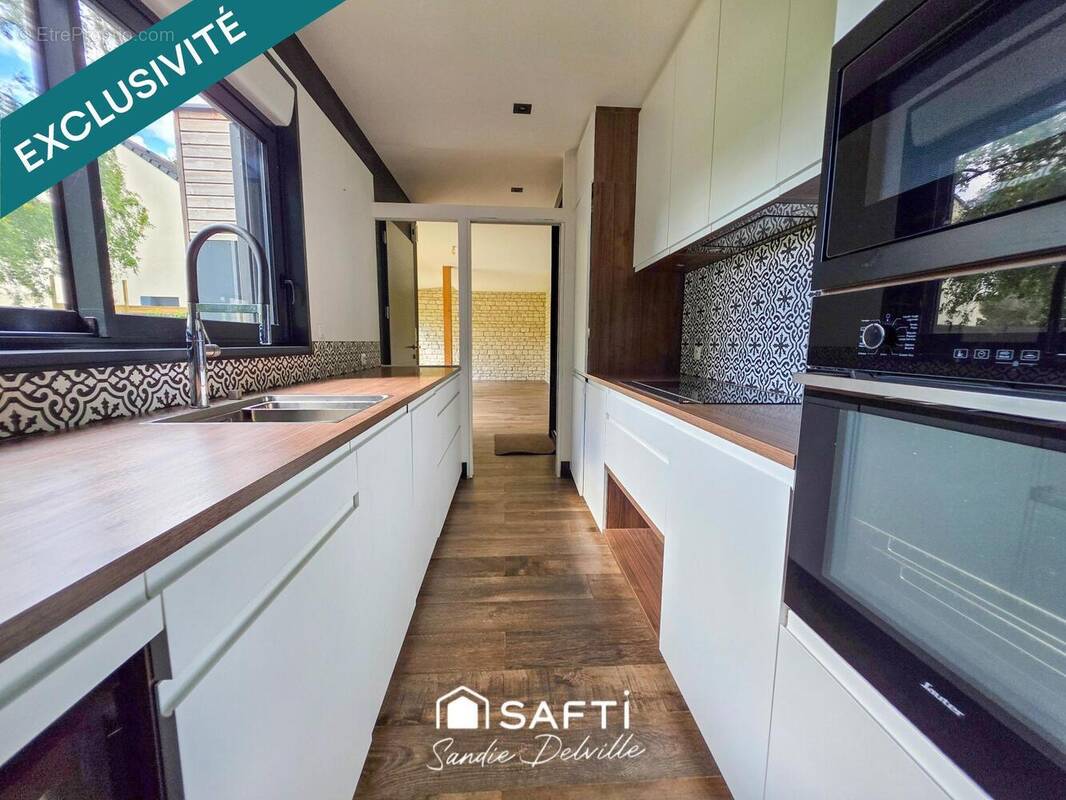 Photo 1 - Maison à QUINCY-VOISINS