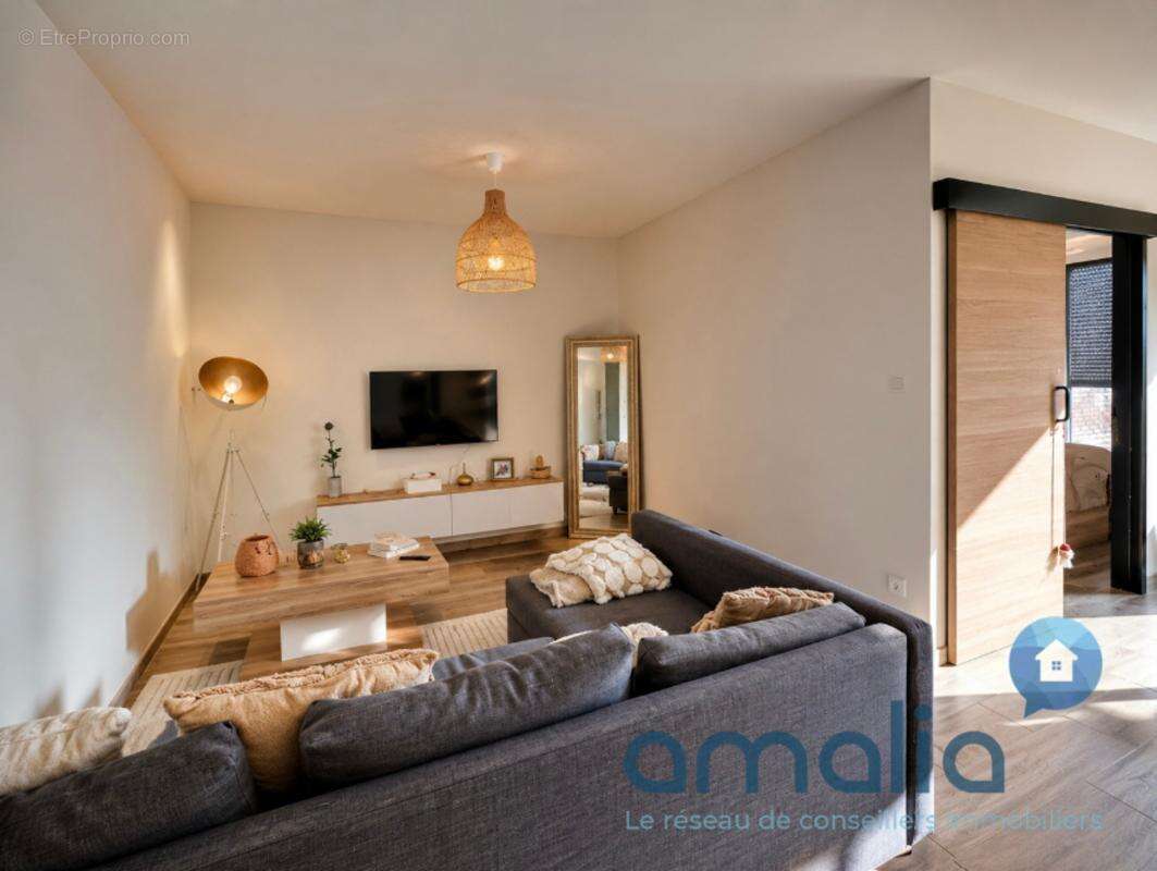 Appartement T2 de standing avec jardin, garage et cave - photo 2