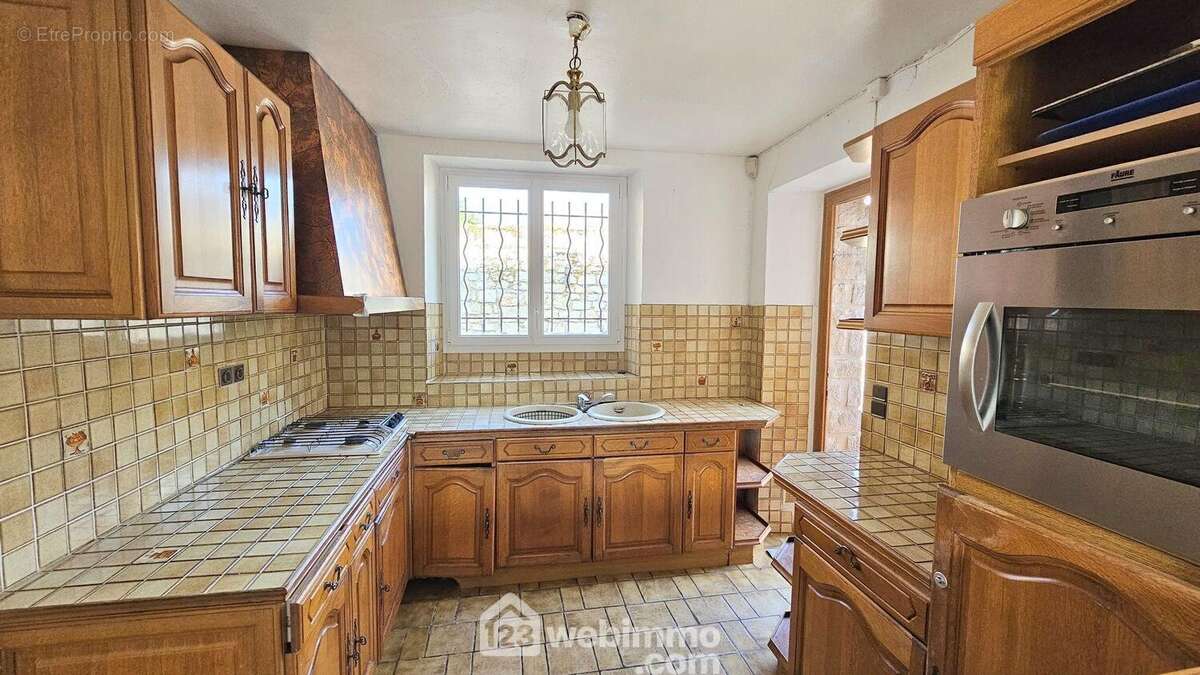 Voici la cuisine toute équipée. - Maison à MILLY-LA-FORET