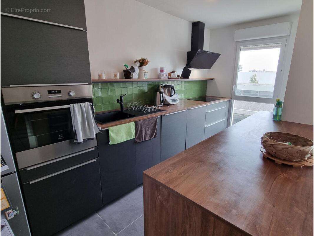 Appartement F4 - photo 2