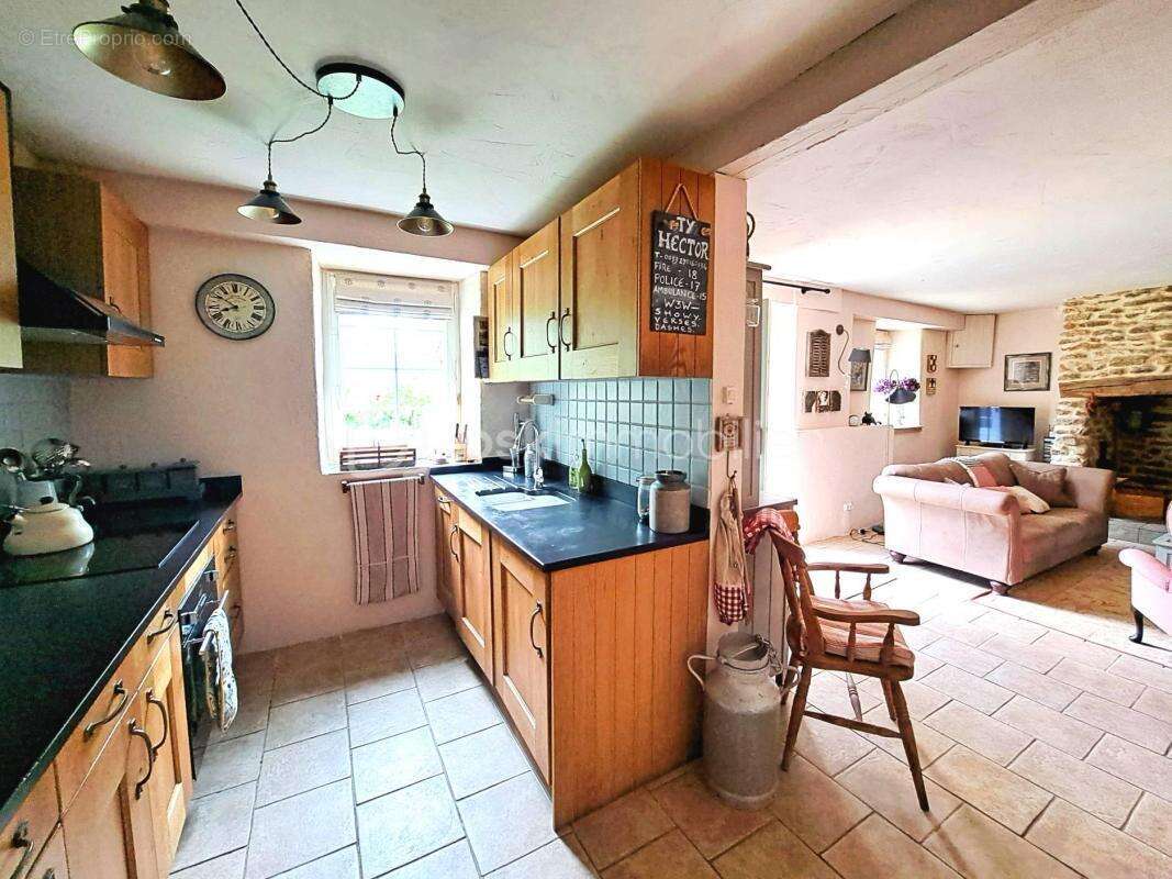 Maison 75 m² à Berrien  - photo 8