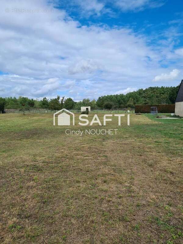 Photo 2 - Terrain à LES RAIRIES