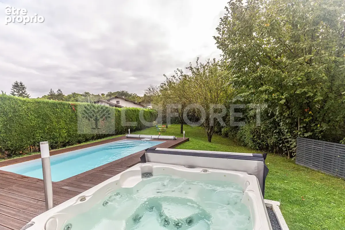 Agence immobiliere laforet - "galanthus" - maison de 136,27m² - terrain de 659m² - garages - piscine - jaccuzzi - dpe d - photo 21