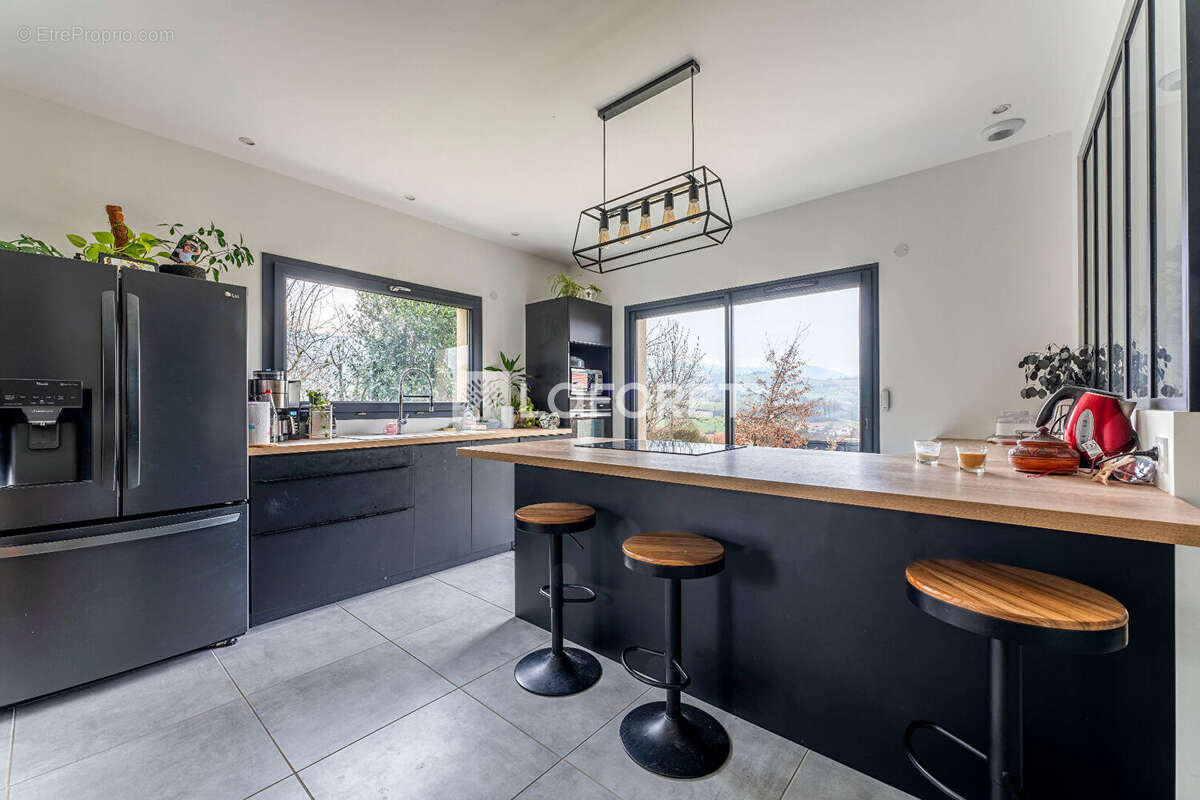 Maison à SOURCIEUX-LES-MINES