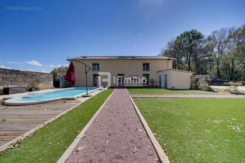 Maison en pierre de 340m² + dépendance 605 00€ FAI - photo 3