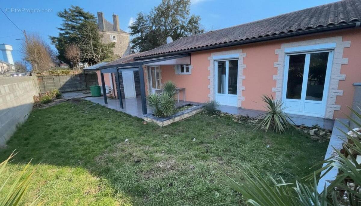 Photo 1 - Maison à LA TRIMOUILLE