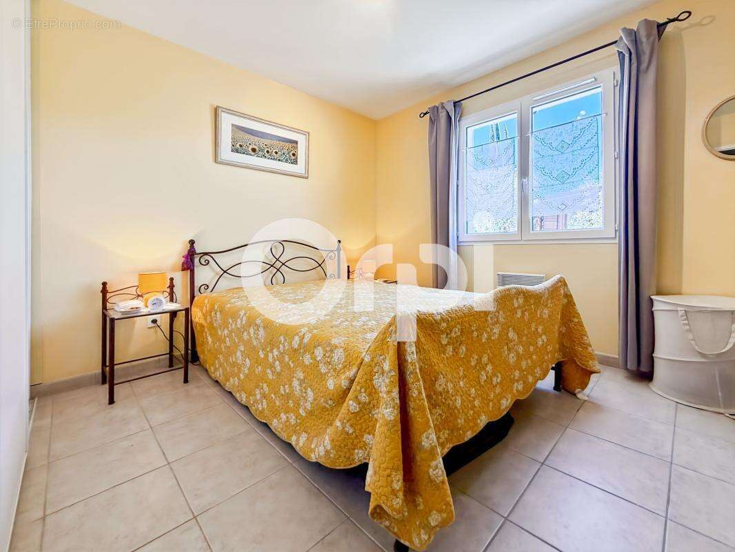 Maison À Vendre sur 1500m² de terrain arboré - photo 13
