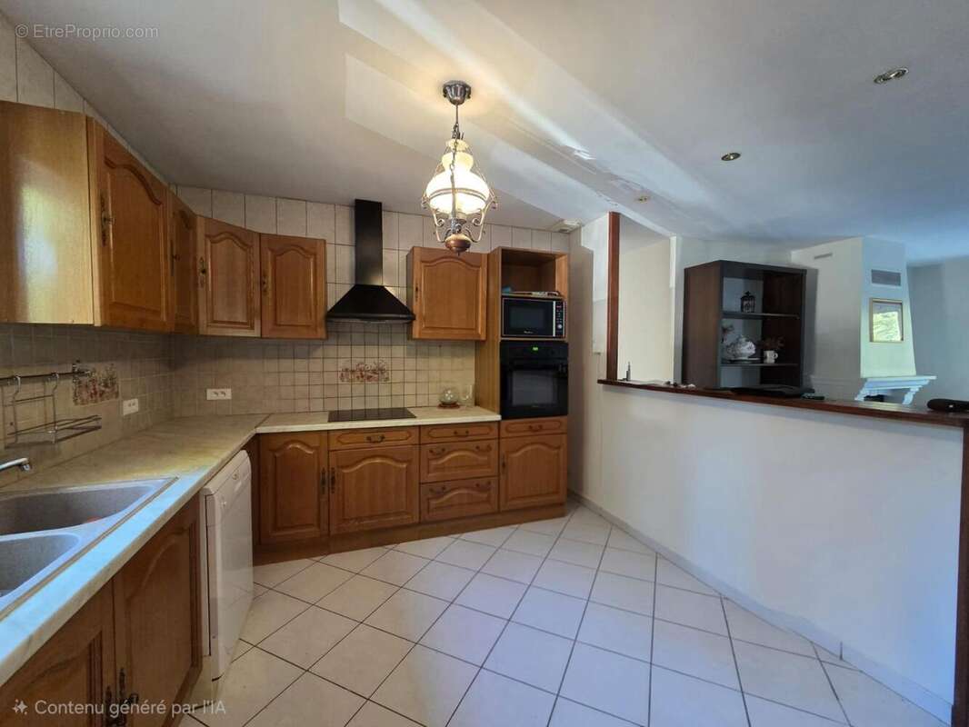 Photo 5 - Maison à REIGNAC