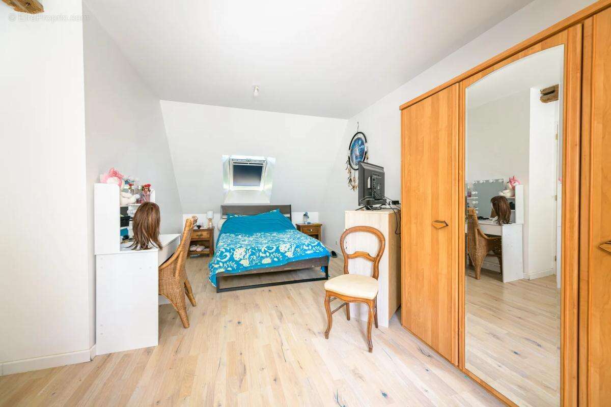 Maison de 5 pièces de 102 m² à Villechauve - photo 13