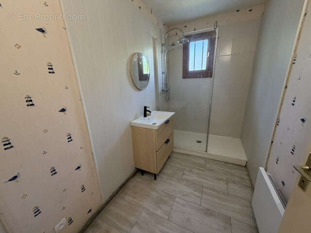 Maison de plain-pied avec garage sur terrain de 900 M2 - photo 10