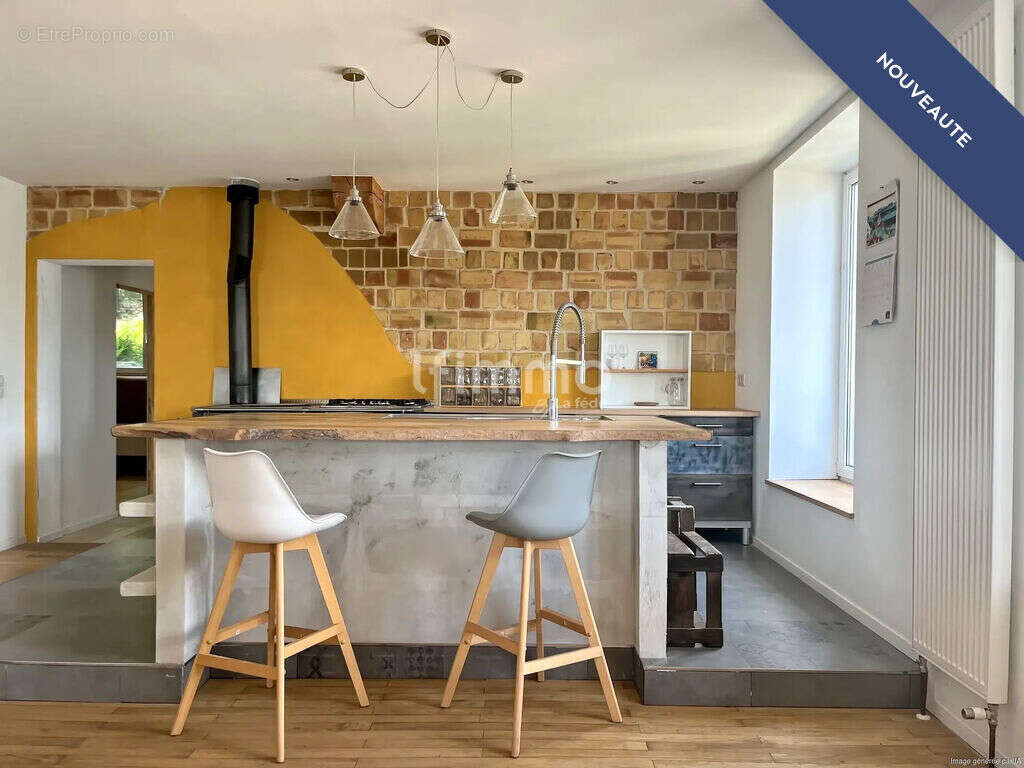 Elégante maison avec deux appartements et une grange - photo 2