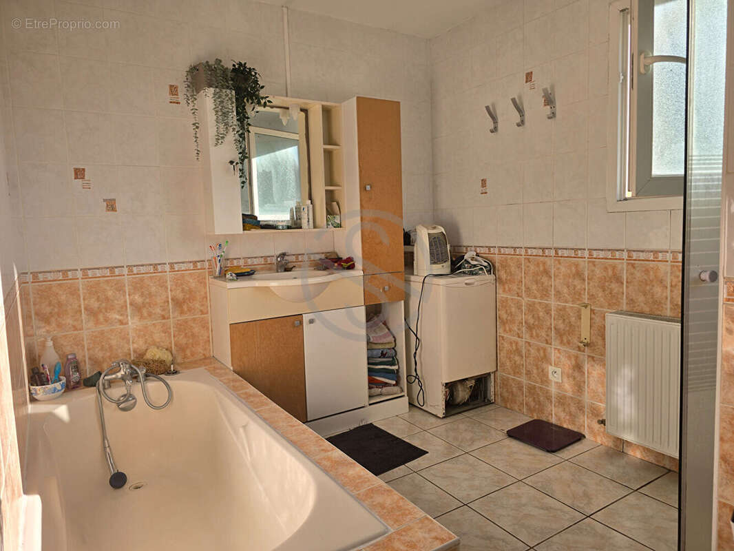 Maison de plain-pied de 126m2 - photo 14