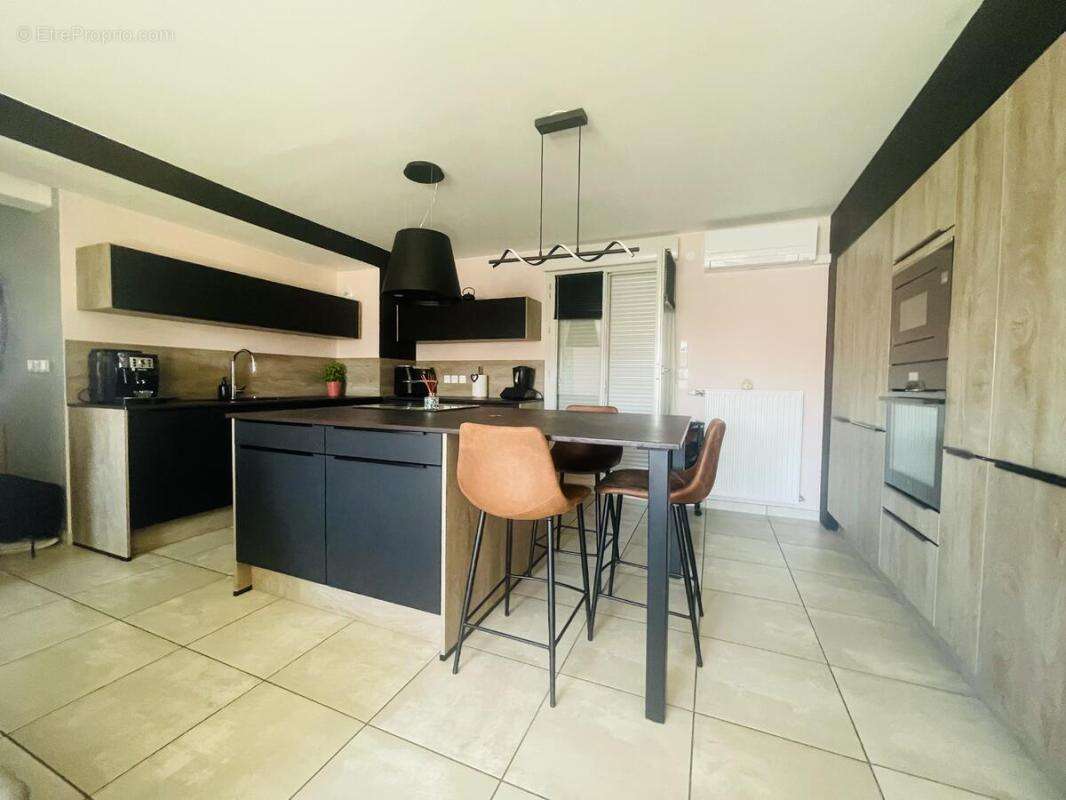 Appartement F3 - photo 5