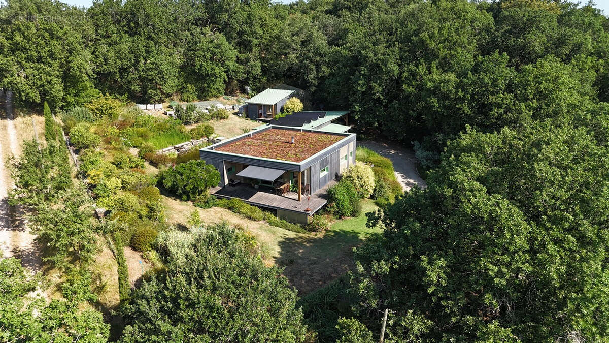 Maison bioclimatique à ossature bois avec gîte, piscine naturelle et autonomie énergétique - photo 13