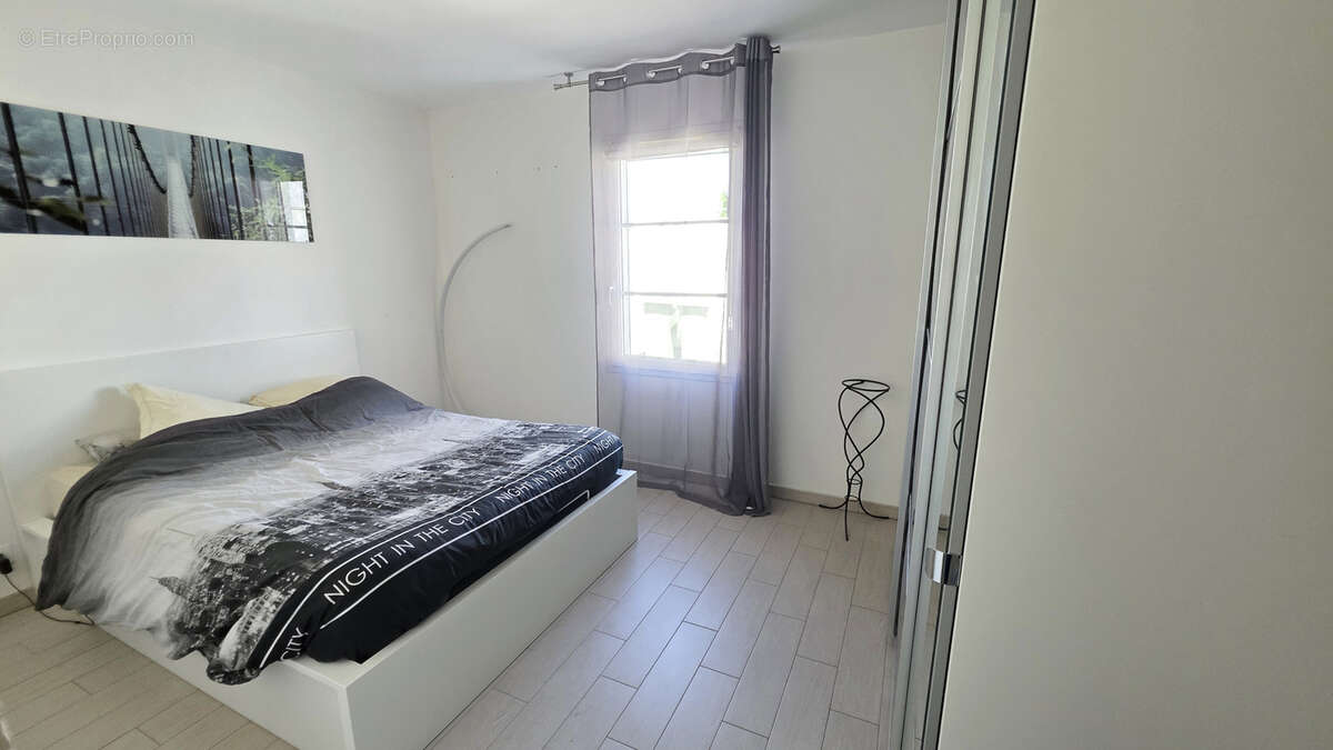 Maison de plain-pied au calme   3 chambres, garage et terrain clos de 437 m2 - photo 7