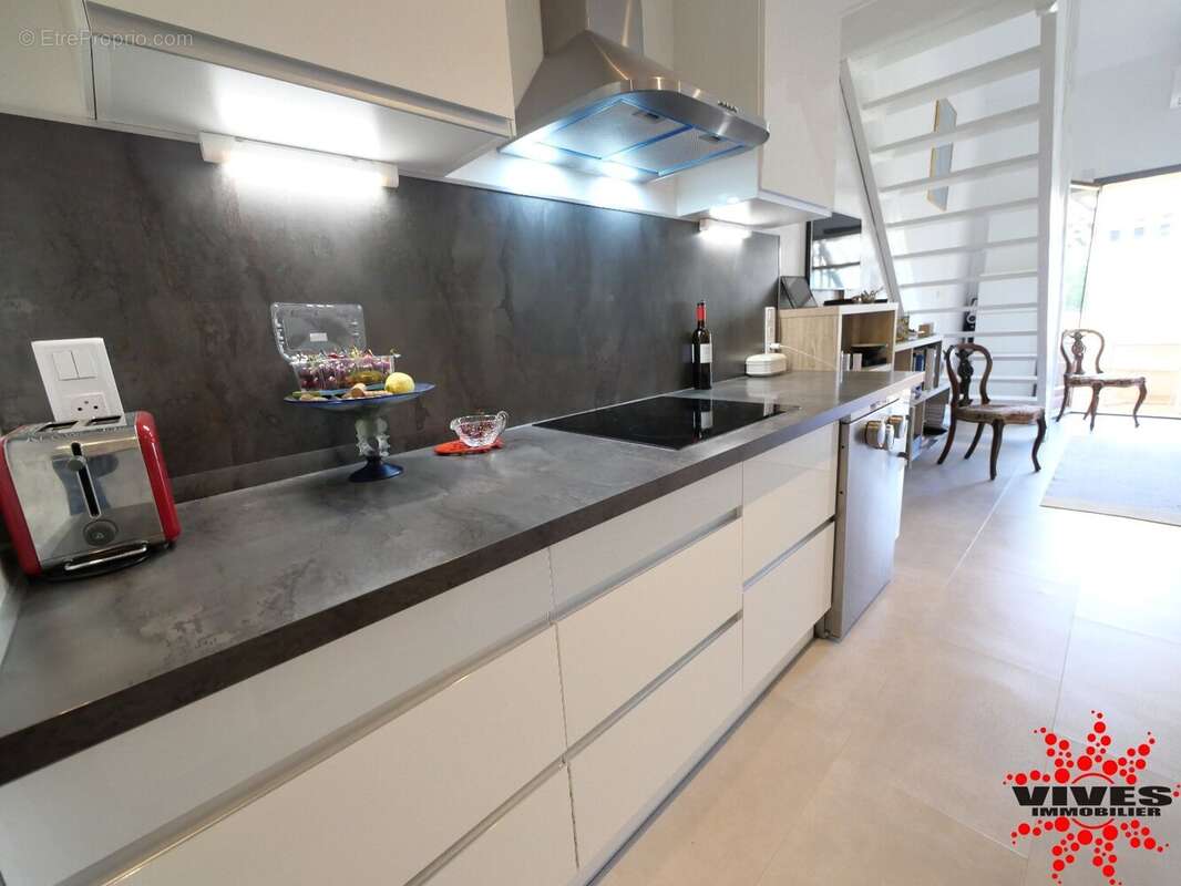Appartement T2 en duplex avec terrasse et parking - photo 3