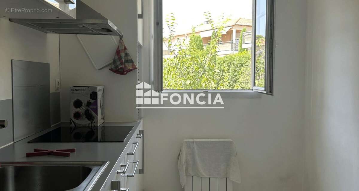 Appartement de 47 m2 avec terrasse de 6,60 m2 et Double stationnement intérieur privatif - Quartier des Viougues - photo 3