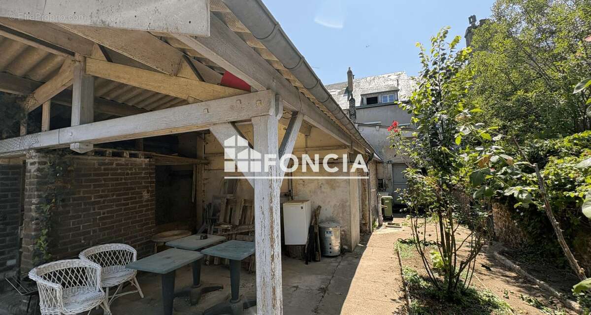 Immeuble de caractère à usage mixte - photo 11