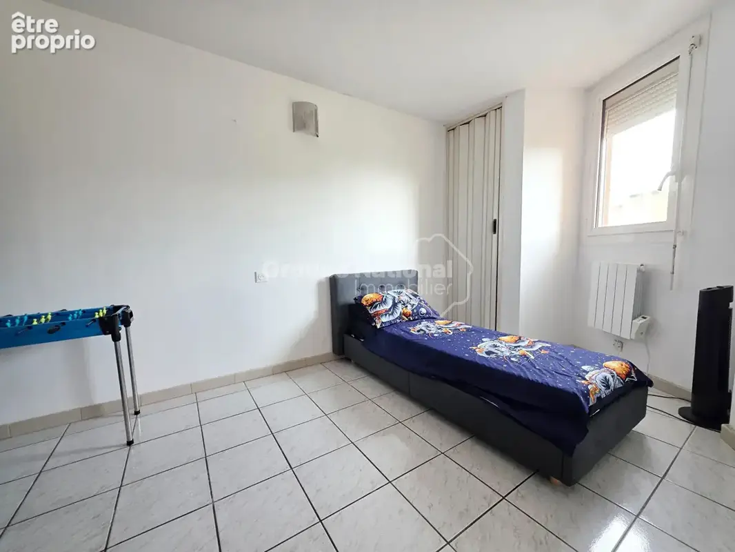 Appartement T4 avec terrasse et garage - photo 7