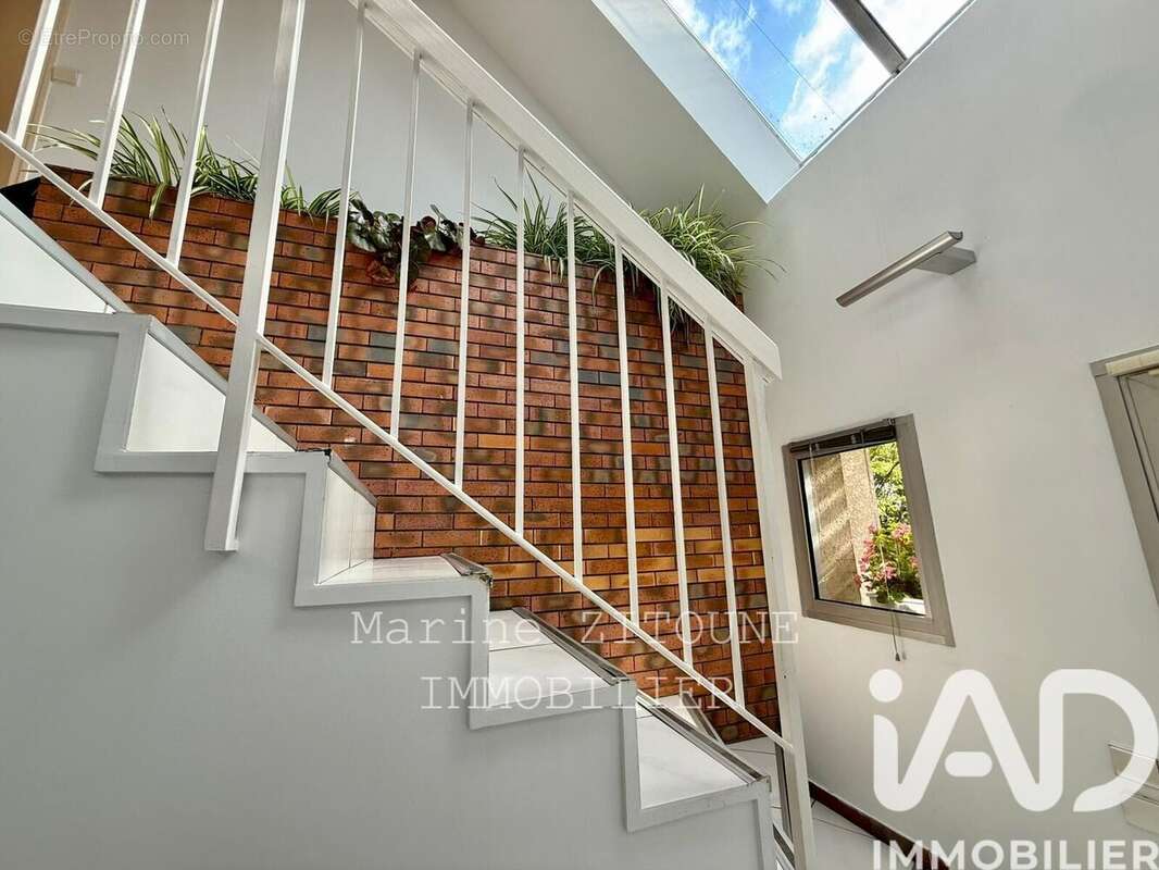 Maison 130 m² à La Ville-Du-Bois  - photo 8