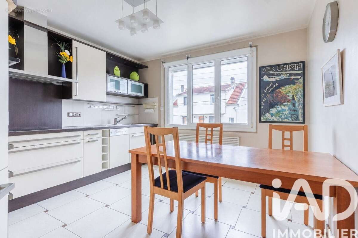 Maison 88 m² à Igny  - photo 7