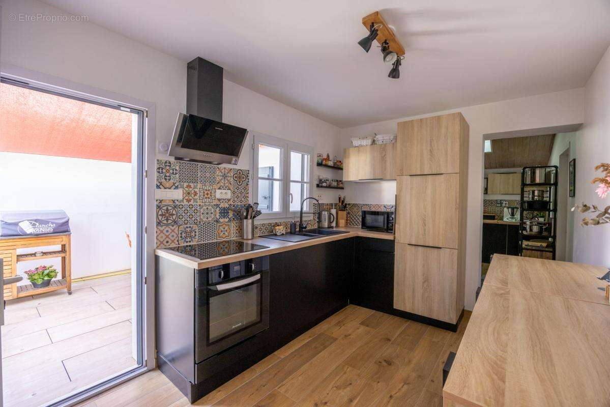 Maison de 101m² - photo 5