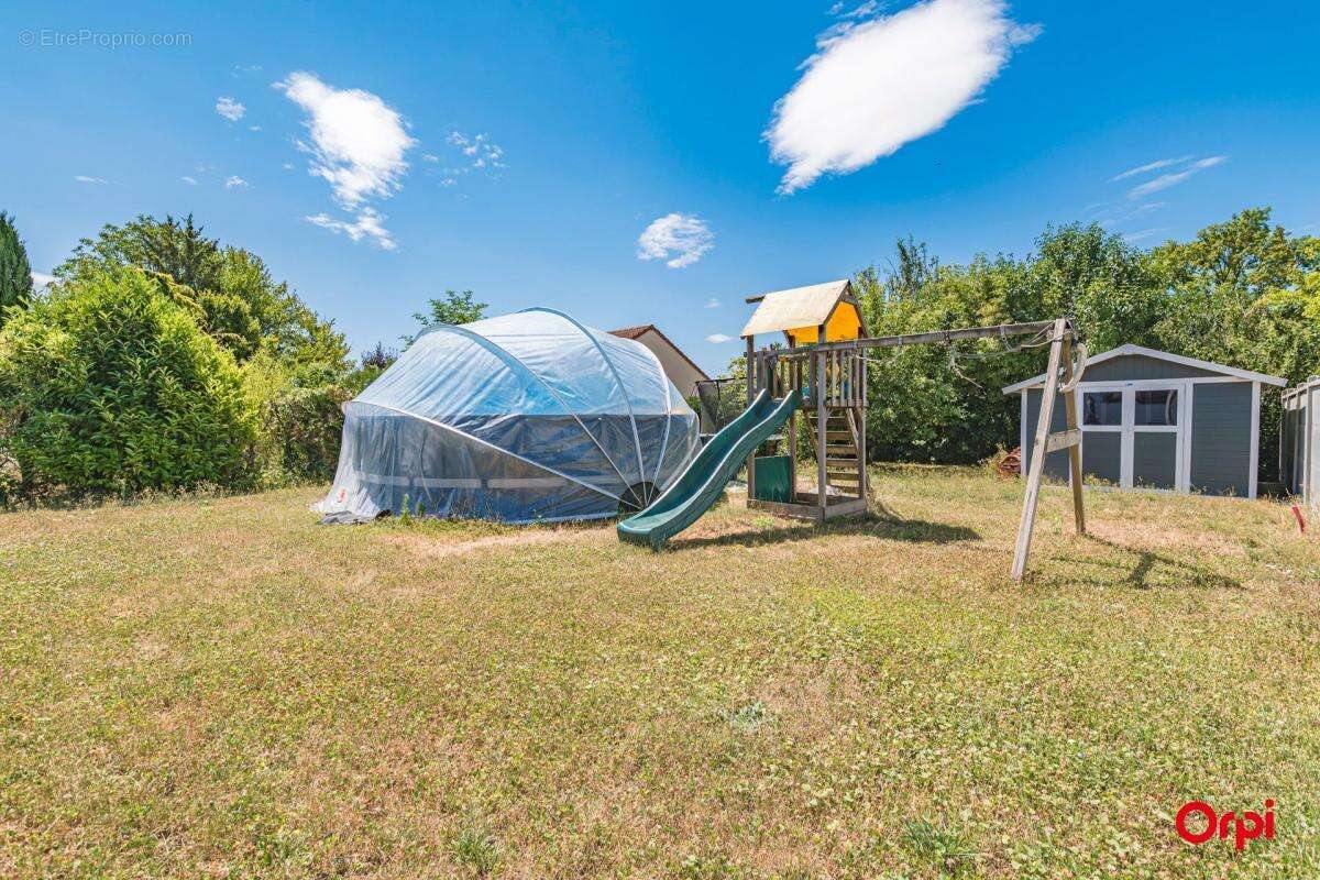 Maison de Plain Pied à Vendre avec Jardin, terrasse et Garage en sous-sol - photo 8