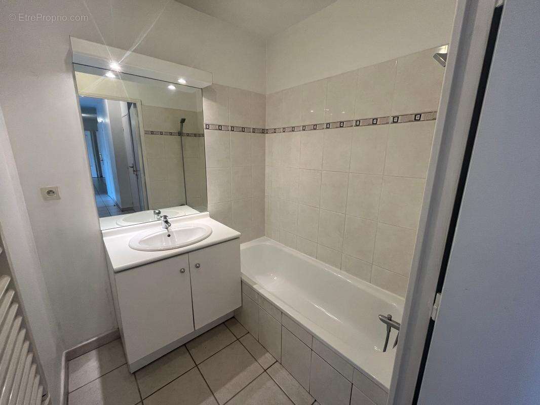 Appartement T4 de 86 m² en rez-de-jardin – Centre de Pont-de-Chéruy - photo 12