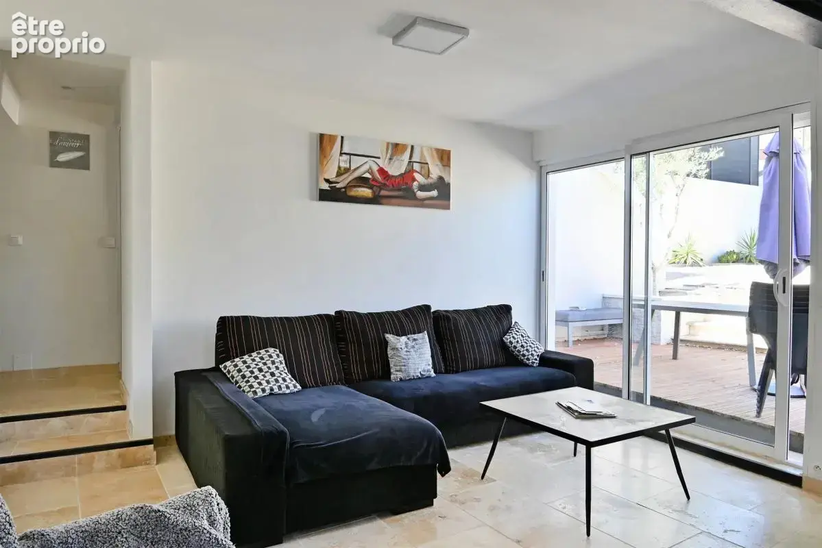 Maison de 5 pièces de 104 m² à Saint-Julien-les-Rosiers - photo 2