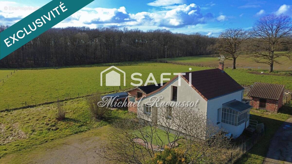 Photo 1 - Maison à TORCY