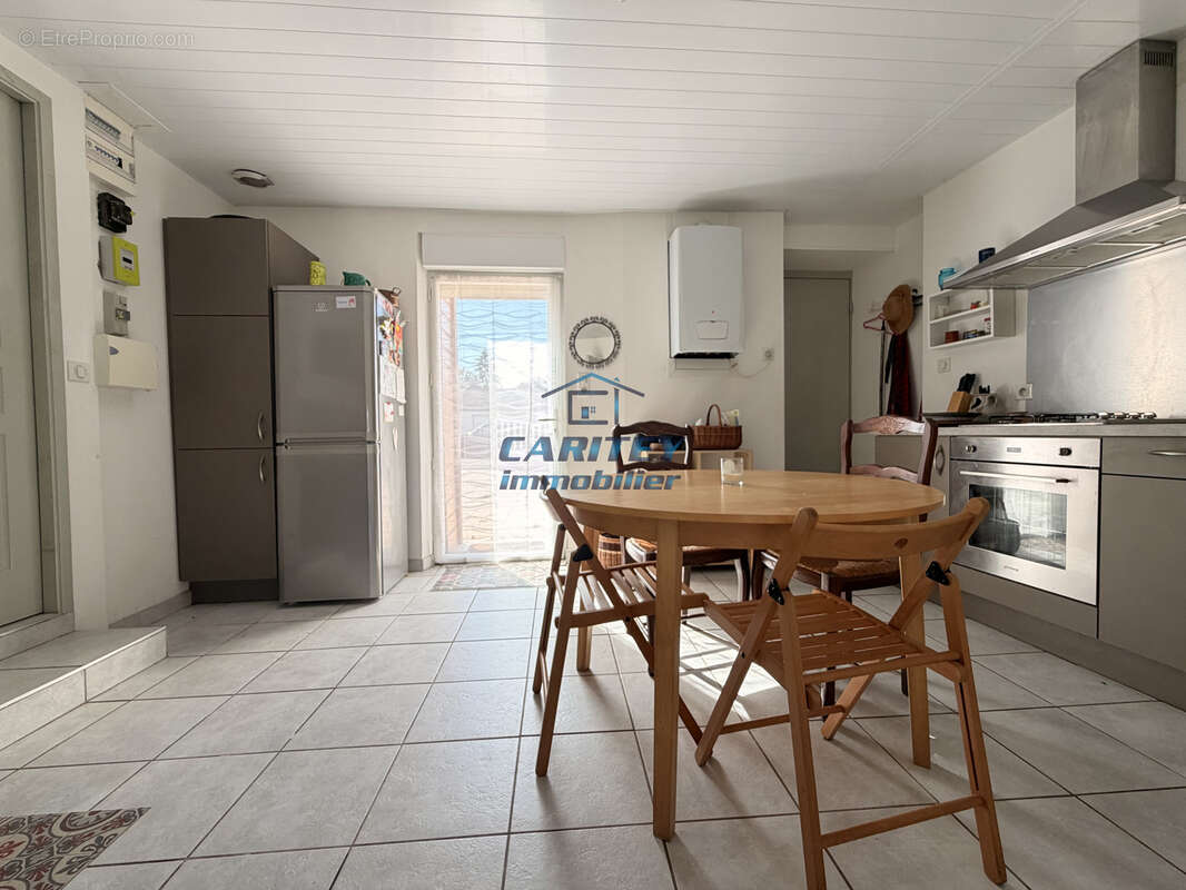 Maison individuelle plain pied en pierre   90 m2   3 chambres   Terrain 1 468 m2 - photo 3