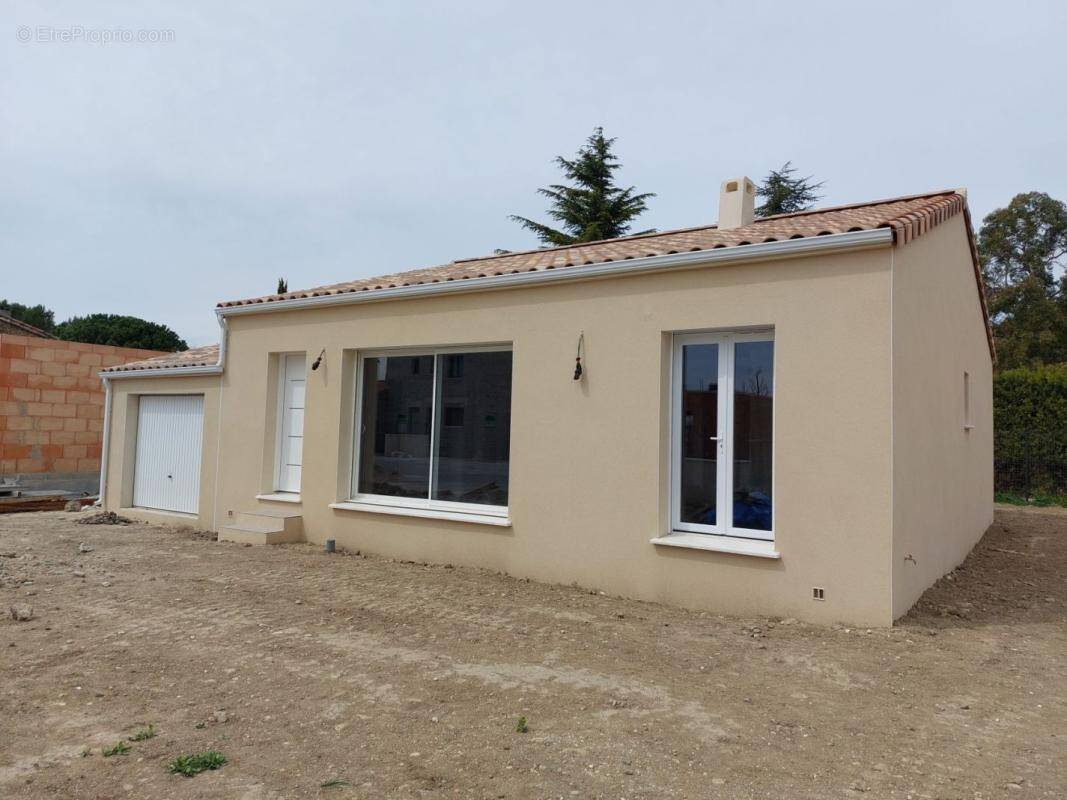 Maison à THEZA