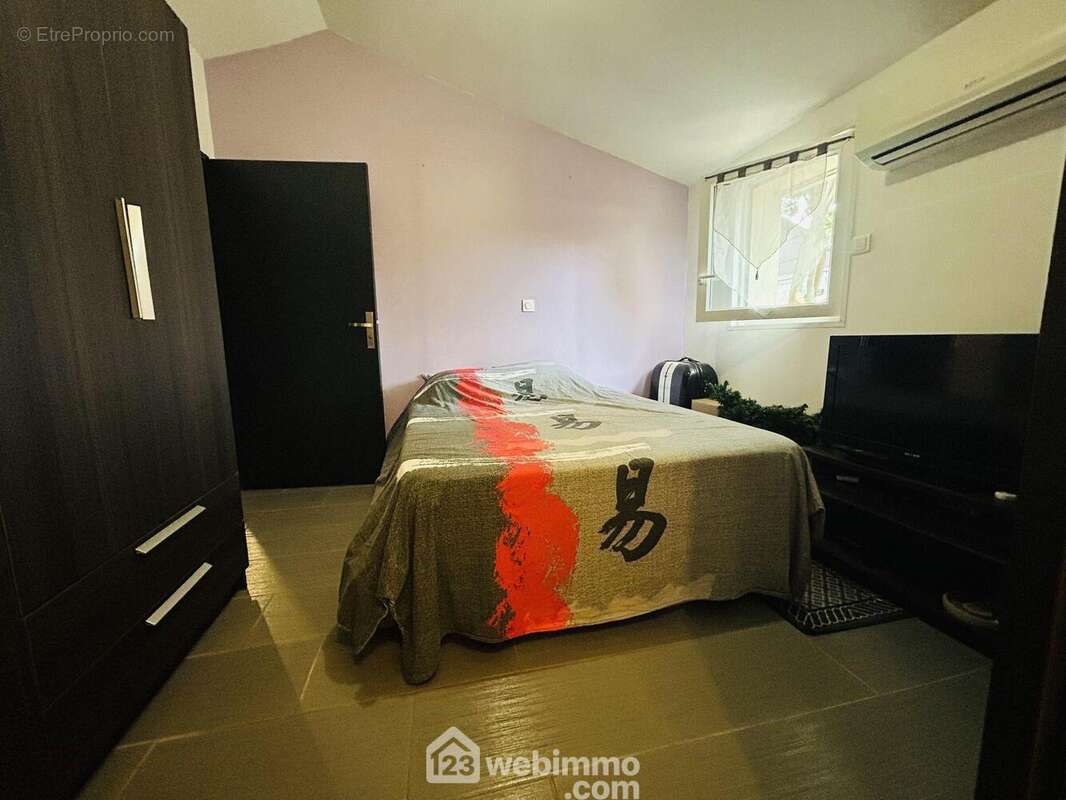 Maison 117 m² à Claira  - photo 24