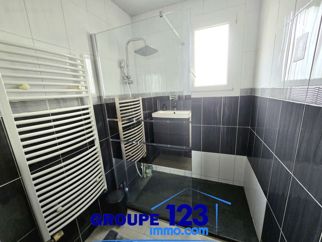 SAINT-GEORGES-SUR-BAULCHE  - Maison familiale 4 chambres, avec terrasse, sous-sol complet et double garage - photo 7