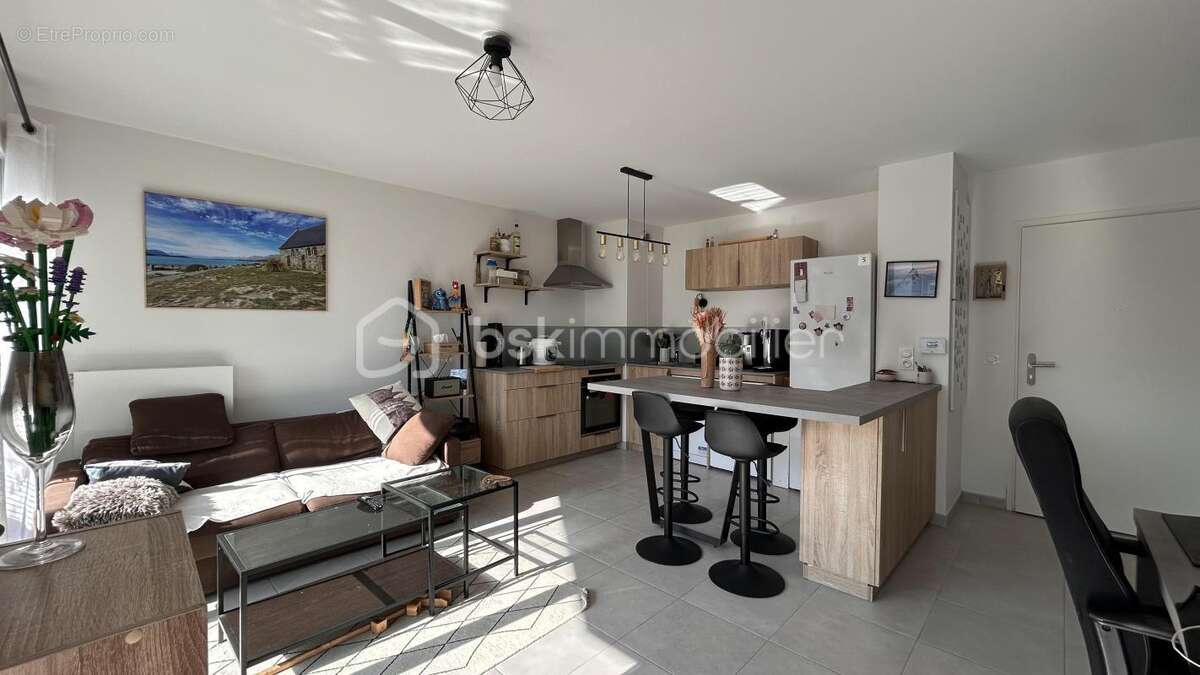 T2 récent 43 m² avec balcon 9,4 m² + parking sous-sol - photo 3