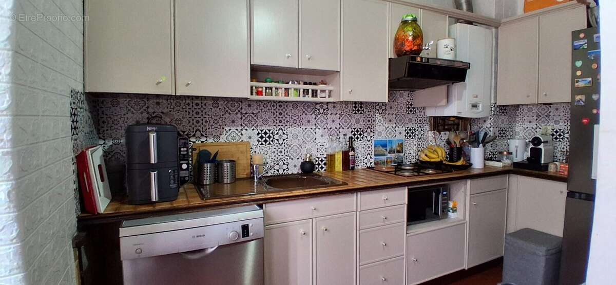 Cuisine pratique et conviviale au quotidien - Appartement à LOUVIERS