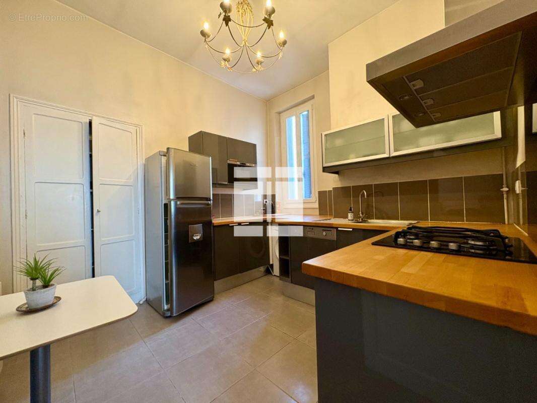 Appartement - centre ville - t3 - photo 7