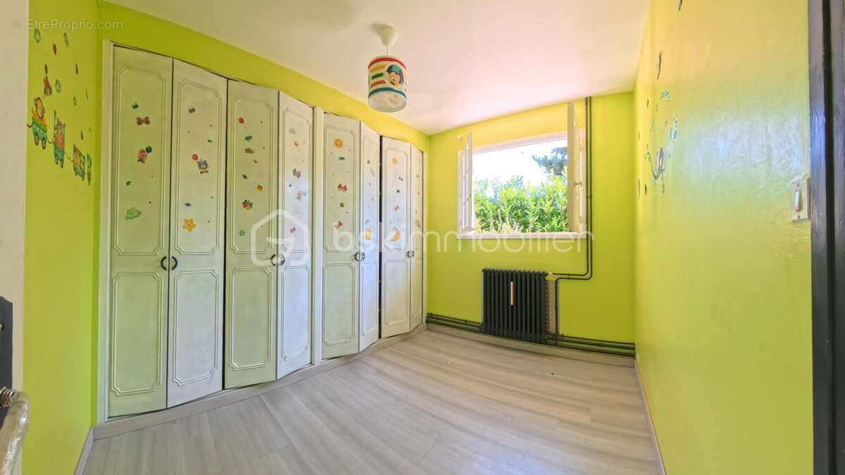 Maison familiale 7 pièces – Environ 130 m² – Grand jardin – Proche centre-ville - photo 9