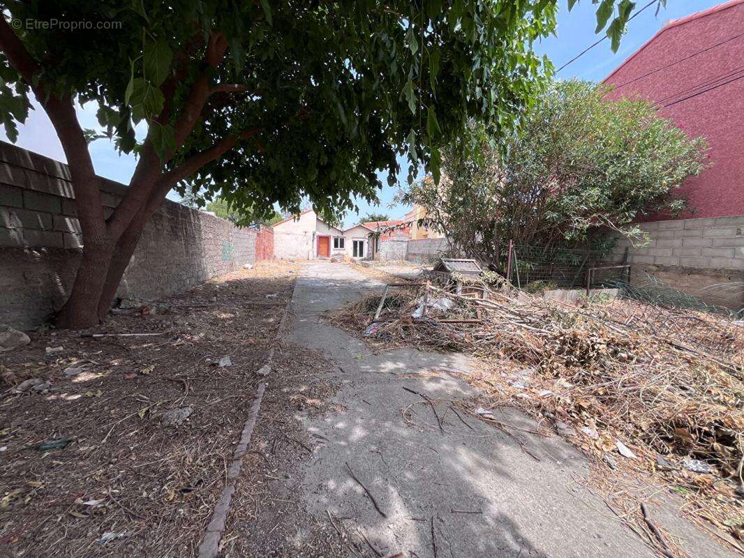 Maison de plain-pied de 95 m² environs avec travaux à prévoir sur un terrain de 509 m² proche de l'aéroport - photo 6