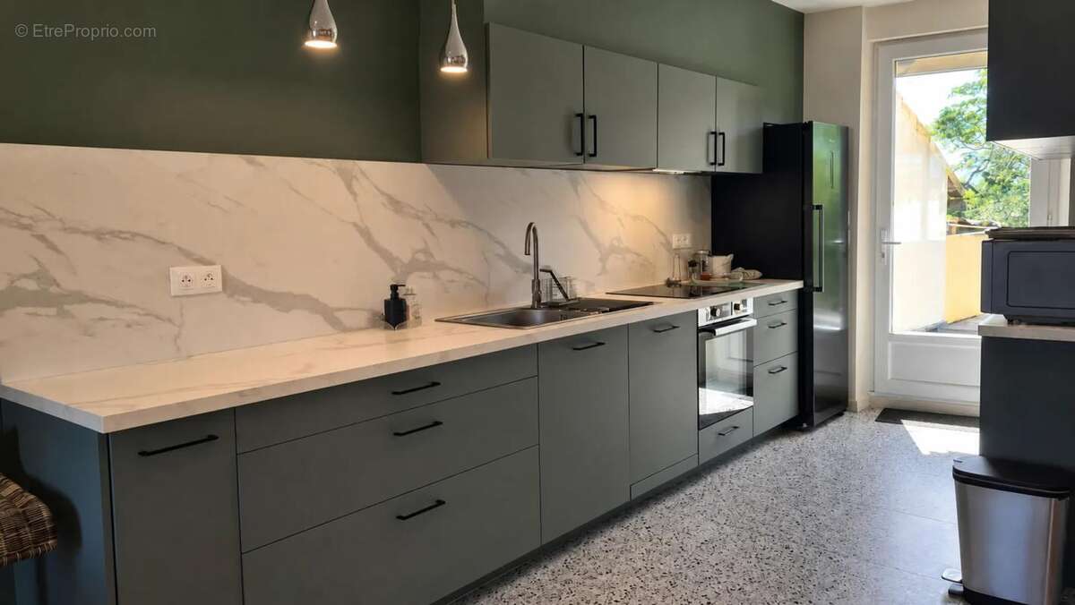 Maison de 7 pièces de 160 m² à Albi - photo 4