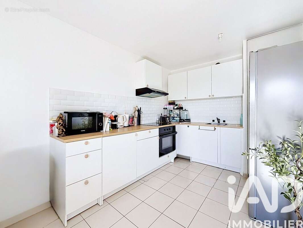 Photo 3 - Appartement à SAVIGNY-LE-TEMPLE
