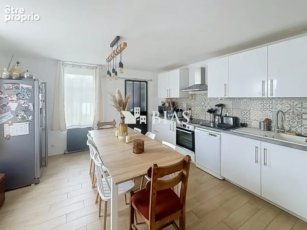 Maison 5 pièces 170 m² à vendre à Alizay (27460) - photo 4