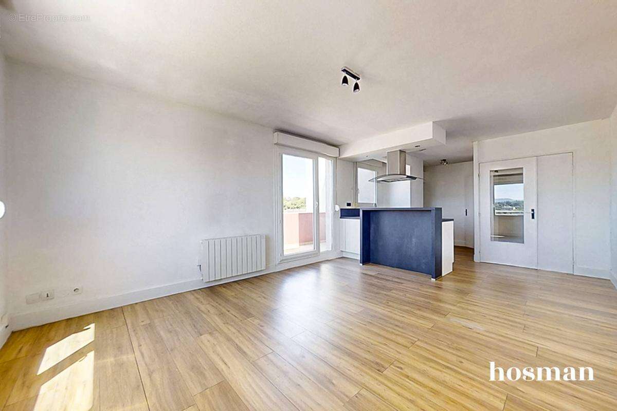 Appartement traversant de 3 pièces de 68 m² avec balcon - Vue dégagée et garage double- Place Jean Monnet, Lyon 9 - photo 4