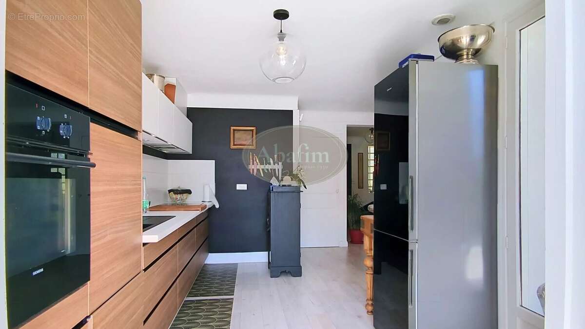 Elégante maison terrasse sous-sol - photo 15