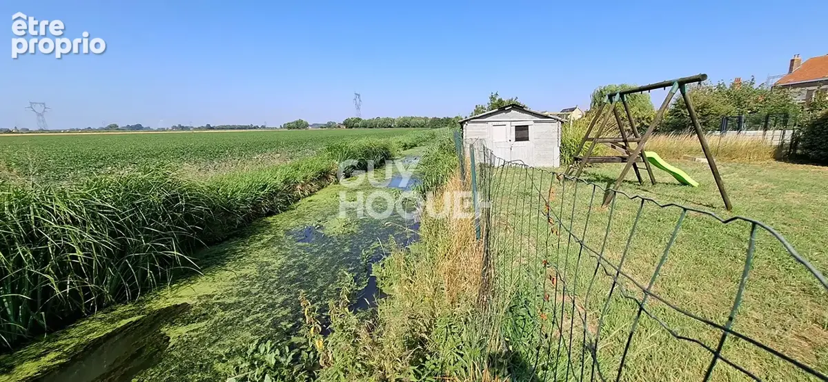 Maison mitoyenne de 192m² entièrement rénovée avec terrain de loisir au bord de l'eau - photo 11