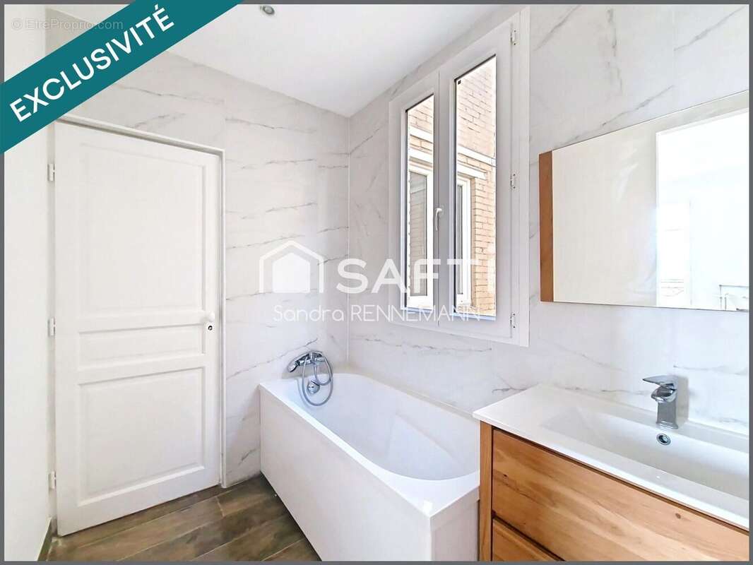 Photo 5 - Appartement à COURBEVOIE